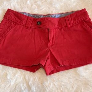 Size 7 red camel shorty shorts. Very flattering!